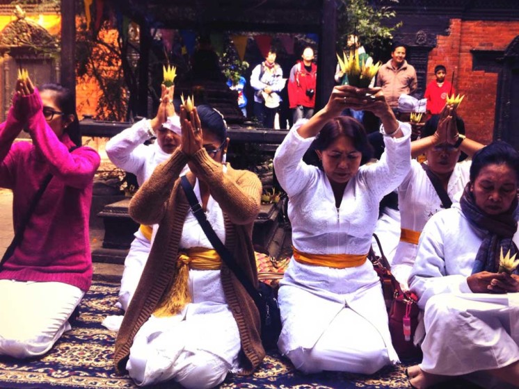 Hindus from Bali - Indonesia praying in front of Kumari ( living goddess of Kathmandu )
